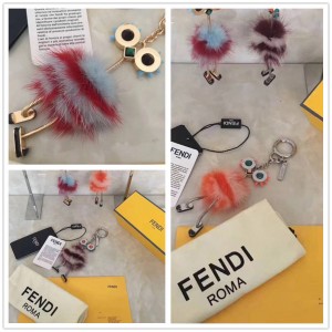 FENDI robot pendant with fur ball pendant